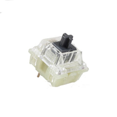 Mechanical keyboard switch with clear plastic housing on a white background